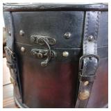 Front Latch Wood and Leather Round Box (Hat type) Very cool, hard to find carrying case  fine detail  leather straps  snap closure  10 inches wide by 9 inches