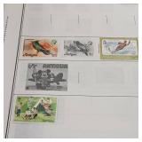 Harris and Co (USA) Statesman Deluxe Stamp Collectors Album  partially full of stamps, many unused and many postmarked