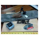 Lot of interesting vintage items  wall art  pencil shaperner body  level iron  cast iron hole punch