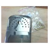 Early 1900s magic scratch removers  vintage flash lights  vintage inkwell and stylus  stainless hand warmer  Tiffen retaining rings