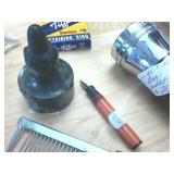 Early 1900s magic scratch removers  vintage flash lights  vintage inkwell and stylus  stainless hand warmer  Tiffen retaining rings
