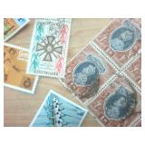 Large Stamp Collection (includes 12 non-expired stamps) from around the world!
