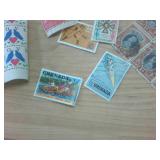 Large Stamp Collection (includes 12 non-expired stamps) from around the world!