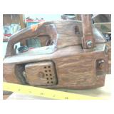 Chainsaw Painted to Look Like its Wooden