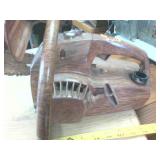 Chainsaw Painted to Look Like its Wooden