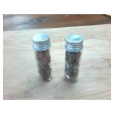 Two tubes of polished agates