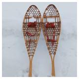 Functional Wooden Snow Shoes from Denver Co (made in Canada)  Leather, wood and sinew  48 inches long 12 inches wide