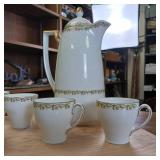 Mettenburg Bavaria  six saucers  four cups and Tea Carafe (10 inches tall) Set -