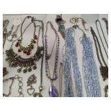 Large Assortment of Costume Necklaces + Hanger