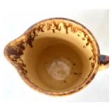 Pair of Antique Spatterware Pitchers