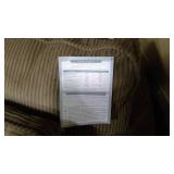 Upholstered Sleeper Couch with tags still on it