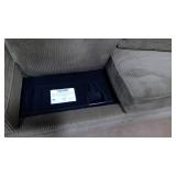 Upholstered Sleeper Couch with tags still on it