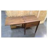 Vintage sewing machine cabinet