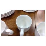 Food Network Stoneware collection = 8 small plates, 5 large bowls, 4 large plates, and 4 mugs