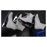 Tote with two pairs of hockey skates, 2 pairs of figure skates, and hockey helmet