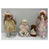 Misc. Collectible Porcelain Dools On Stands In Protective Bags