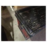 White Dresser, Red Chest, and Wooden Table