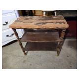White Dresser, Red Chest, and Wooden Table