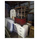 White Dresser, Red Chest, and Wooden Table