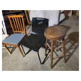 Lot of Chairs and Stools including White Spindle-Back Chair, Wooden Chair with Blue Cushion, Black Plastic Chair, and Wooden Bar Stool