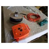 Orange Extension Cord Reel, Black Cable Reel, and Extension Cords