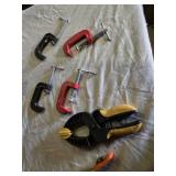 Woodworking Clamps and Tools Assortment including Sjobergs Wooden Clamp, Spring Clamps, and C-Clamps