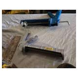 Lot of Hand Tools including Caulking Guns, Scrapers, and Grinding Disc