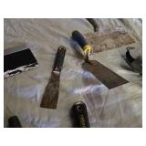 Lot of Hand Tools including Caulking Guns, Scrapers, and Grinding Disc