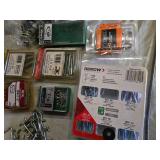 Lot of Hardware and Tools including Permatex Muffler & Tailpipe Band, Stanley Utility Knife, and Arrow Assorted Rivets