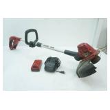 Toro Cordless Weed Trimmer with Charging Block and Battery