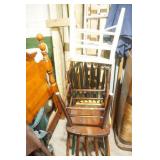 TV entertainment center, vintage wooden chairs, headboard, metal frame, mirror