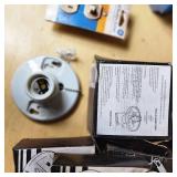 Lot of Electrical Supplies Including Porcelain Pull Chain Lampholders, GE Wall Switch Outlet, and Electrical Boxes