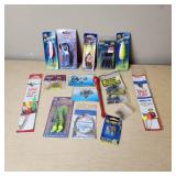 Fishing Tackle including Eagle Claw Snells, Cyber Flex Grubs, and Blue Fox Big Crappie Jigs