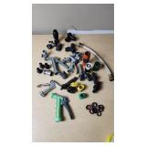 Assorted Garden Hose Connectors, Nozzles, and Accessories