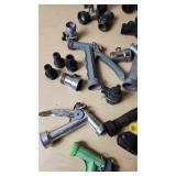 Assorted Garden Hose Connectors, Nozzles, and Accessories