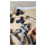 Assorted Garden Hose Connectors, Nozzles, and Accessories