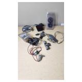 Assorted Vehicle Electrical Components and Accessories including Wiring Harnesses, Connectors, and Decorative Items