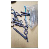 Eye bolts and hooks including red and black painted options, various sizes and types