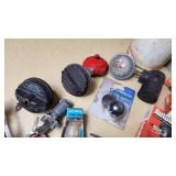 Assorted Automotive Parts Lot including Dorman Sending Unit Retainers, Autolite Spark Plugs, and Anti-Theft Door Lock Knobs