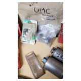 Assorted Automotive Parts Lot including Dorman Sending Unit Retainers, Autolite Spark Plugs, and Anti-Theft Door Lock Knobs