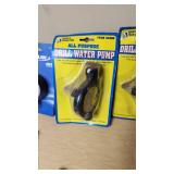 Various Brands Plumbing and Air Tool Accessories including Drill Master Drill Water Pumps, Merlin Pressure Gauge, and Apache Air Hose Lot