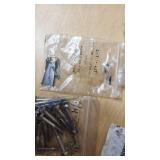 Assorted Hardware and Fasteners including Nylon Lock Nuts, Bolts, and Washers