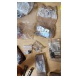 Various Hardware and Plumbing Parts including SharkBite Connectors, Springs, and Belwith Cabinet Hardware