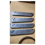 Assorted Hardware and Tools including Shelf Brackets, Wooden Dowels, and Cable Spool