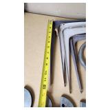 Assorted Hardware and Tools including Shelf Brackets, Wooden Dowels, and Cable Spool