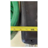 Green oil drain pan and black oil storage container