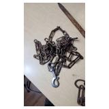 Assorted Pet Supplies and Hardware Including Chains, Cables, and Tools