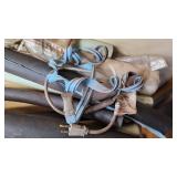 Assorted Construction and Plumbing Supplies including Squeegee, Fuel Tank Strap, Heating Tape, and Insulation Rolls