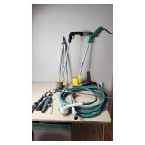 Garden Tools and Equipment including Weed Eater Grass Trimmer, Hose, and Accessories