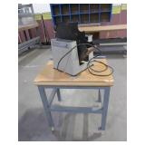 ROLLING METAL TABLE WITH PAPER JOGGER